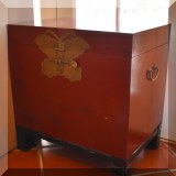 F24. Small Asian trunk on stand with butterfly latch. 23”h x 22”w x 16”d 